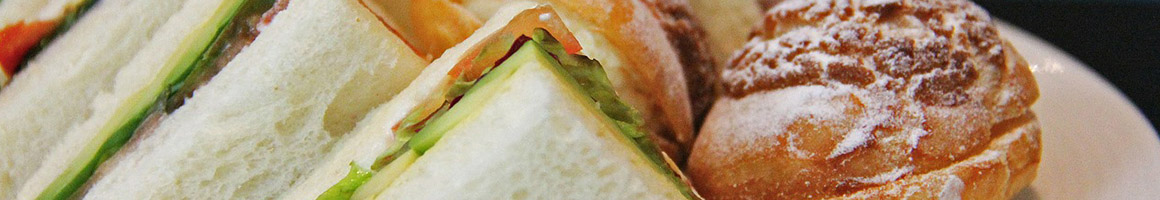 Eating Deli Sandwich at Top Bagels restaurant in Fair Lawn, NJ.